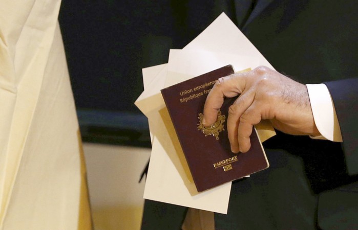 French court upholds ban on smiling in passport photos